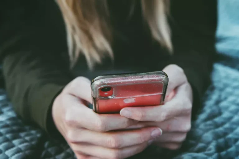 Teenager on phone researching diets